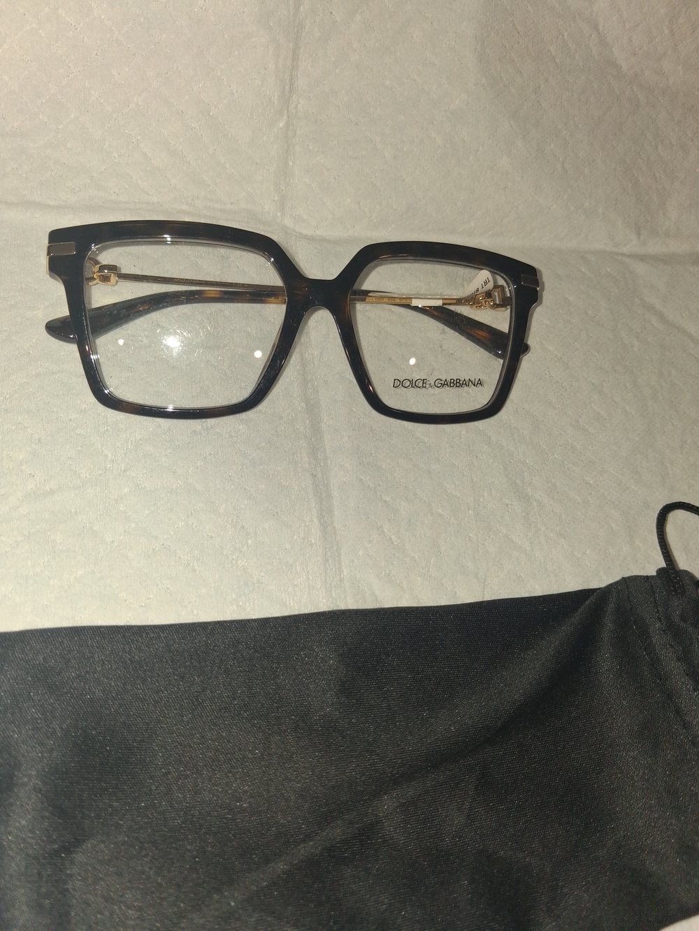 Dolce & Gabbana DG3397 eyeglasses frame in a shiny dark tortoise pattern.